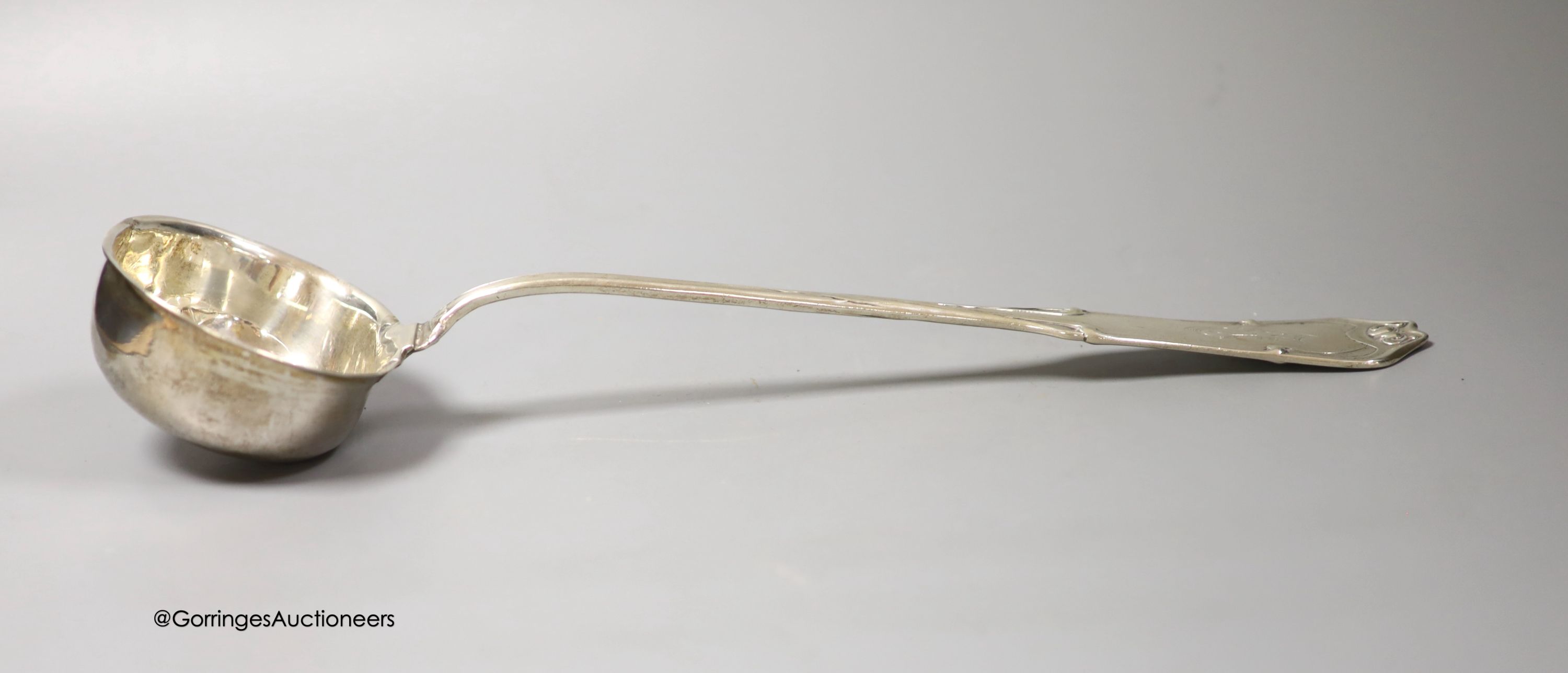 A German 800 standard white metal soup ladle, with engraved initial (a.f.), 36.7cm, gross 8oz.